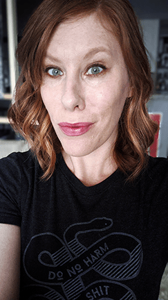 Picture of Lindsey Obermeier. She has red hair.